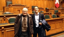 Zoom image: Gardner with Dr. Thomas Fleiner, professor at the University of Brig, visiting the National Council’s chamber in Vienna, Austria. 