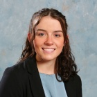 Young woman, smiling.