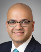 man wearing suit.