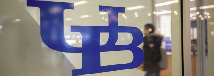 photo of UB log on a window.