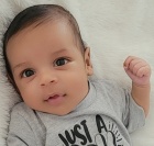 photo of a baby in a blanket.