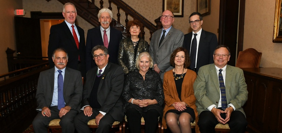 group of people gathered for a photo. 