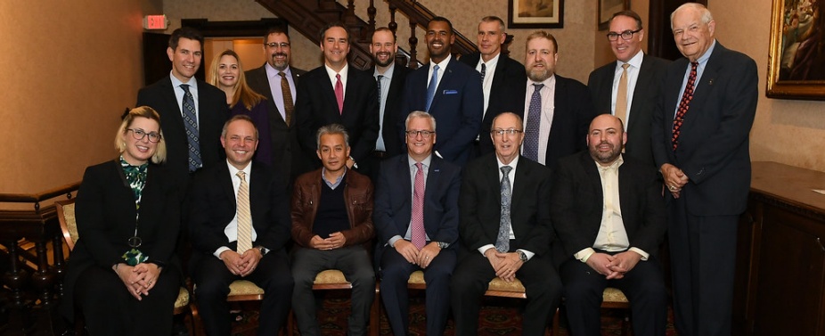 group photo of people smiling.