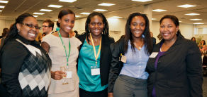 group of young women, smiling. 