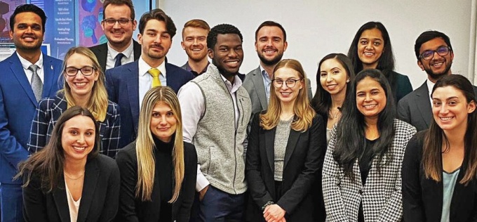 group of students smiling. 