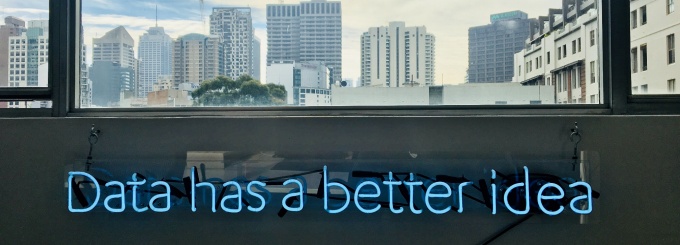 photo of a neon sign that reads "Data has a better idea".