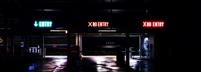 Parking garage exit with one lane open.