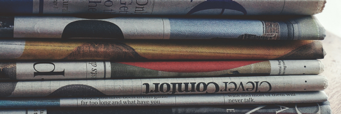 A stack of newspapers.