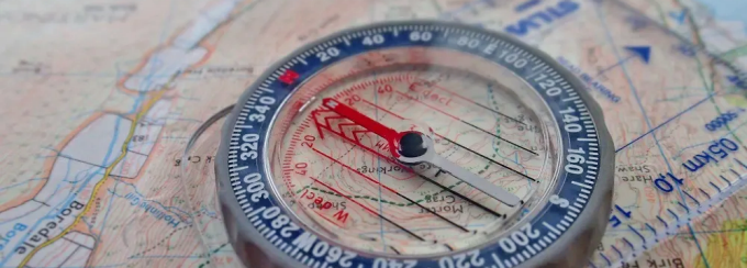 a compass on a map. 