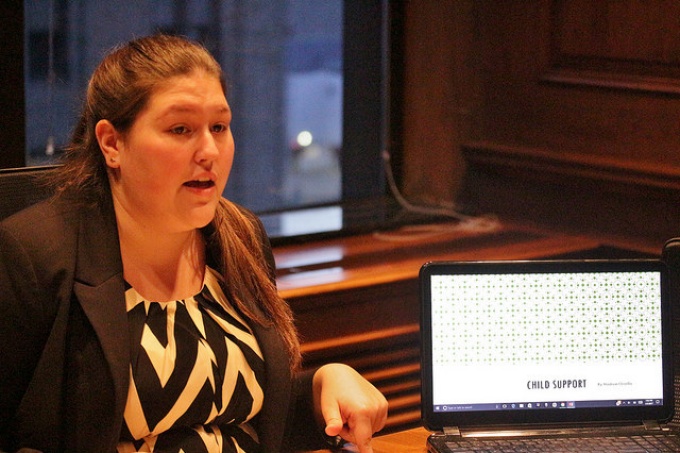 Image of law student presenting about child support.