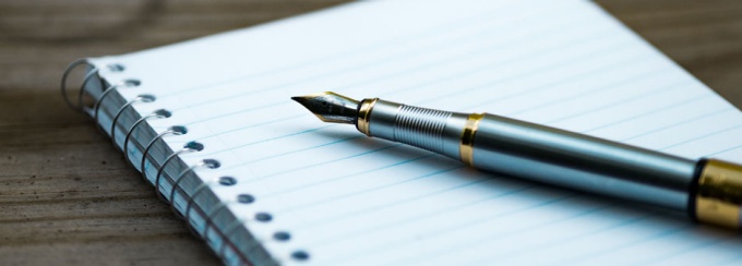 photo of pen on paper.