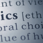 a closeup of a book showing the text for the definition of the word Ethics. 