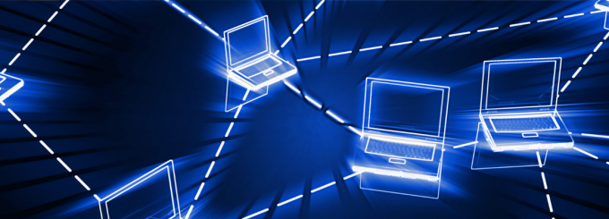 Blue illustration of white, glowing laptop computers linked to one another using dashed lines. 