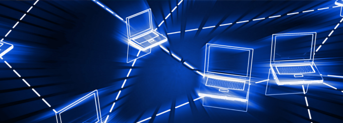 Blue illustration of white, glowing laptop computers linked to one another using dashed lines.