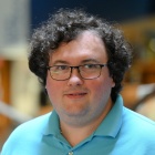 Zvierviev standing in the law library.