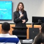 Man standing in front of a classroom of students. 