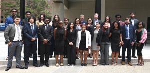 Zoom image: Our 2024 Discover Law Scholars with Dean S. Todd Brown; Professor Luis Chiesa, vice dean for diversity, equity and belonging; and Kristen Kelly, director of the Discover Law Program. 