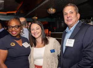 Zoom image: Hon. Kathy King '84; Emilie Rosenbluth, director of advancement; and Marc Alpert '86. 