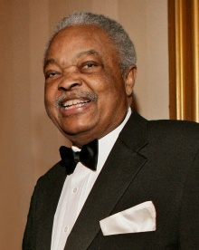 Judge Green smiling.