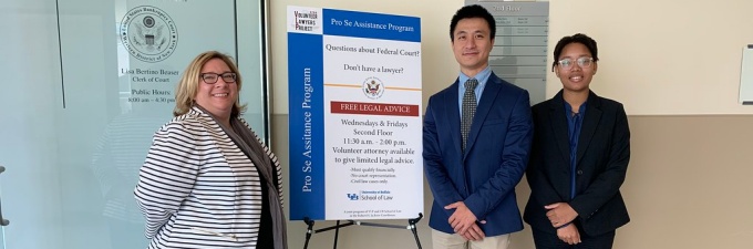 Vice Dean Bernadette Gargano with Zarianna Peterson and Aaron Lin.