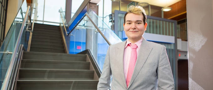 farruggia standing in front of a set of stairs.
