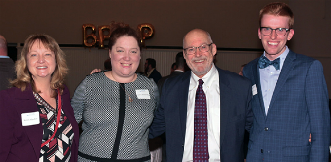 Left to right: Karen L. Nicolson '89, CEO for the Center for Elder Law and Justice; Dean Aviva Abramovsky; Garry M. Graber '78, and Christopher J. Phillips '20. Phillips spent the summer after his first year of law school at the Center for Elder Law and Justice with the support of a Garry Graber fellowship.