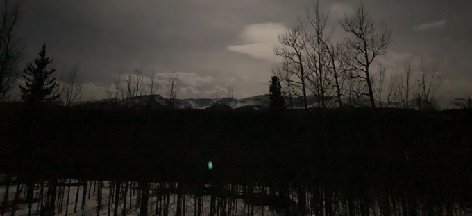 photo of a snowy morning on a field.
