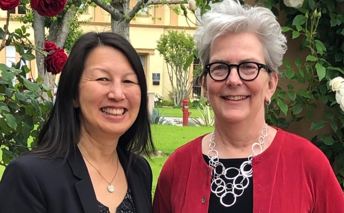 photo of Soong and Dwyer standing outside.