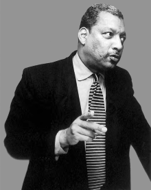 black and white photo of Carr, lecturing.