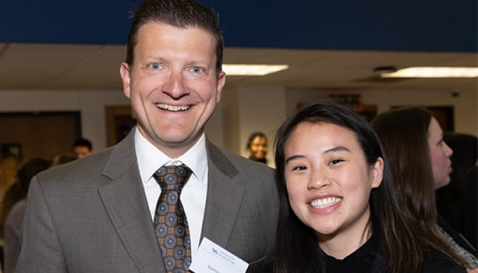 Matthew M. Becker '02 and Theresa Lee '25, smiling.