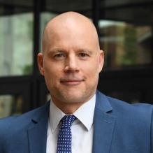 man standing outside.