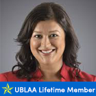 woman smiling, text that says UBLAA Lifetime Member. 