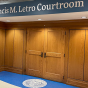 the entrance to the Francis M. Letro Courtroom. 