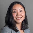 Young woman smiling.