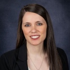 Young woman smiling.