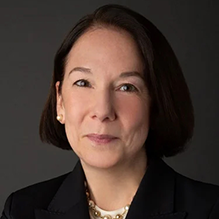 Woman gold necklace, smiling.