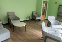 Zoom image: room with chairs, wooden floors